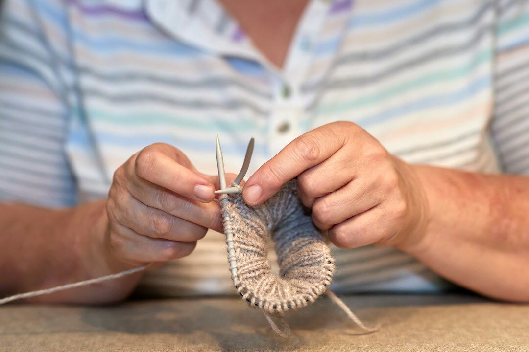senior woman doing craft activity