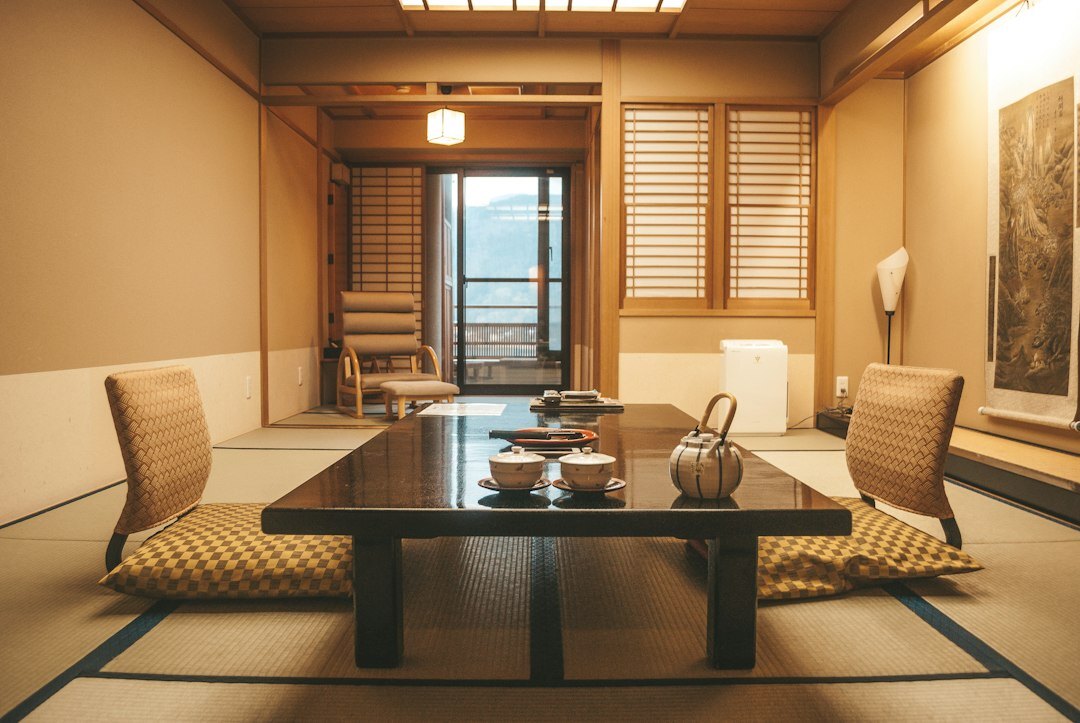 Japanese senior friends relaxing at a traditional ryokan hot spring resort