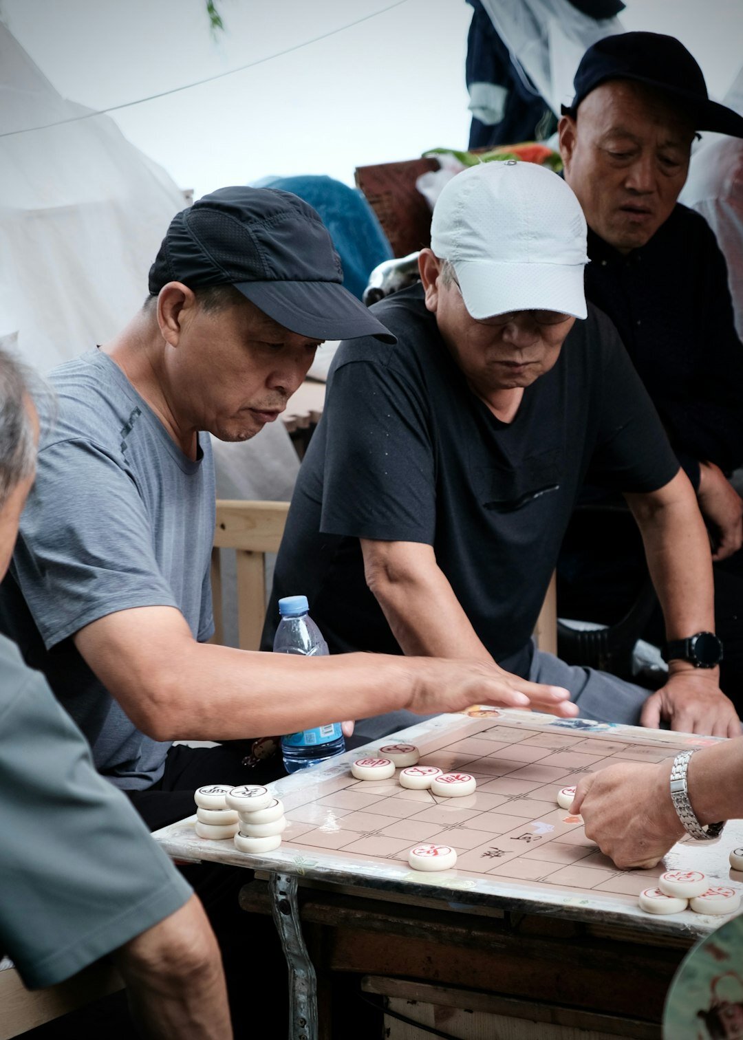 group of elderly playing board games