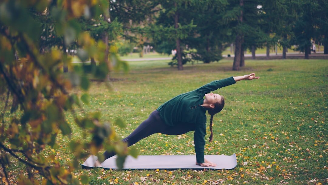 elderly doing yoga outdoors